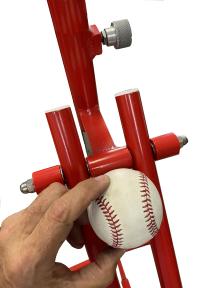 Place ball on ramp and release ball for testing baseball, softball, cricket fields and polo fields ball roll length