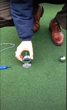 Take the Digital depth meter on the Precision Putting Green Firmness Compaction Meter and place it on top of the washer and let it rest on the washer to measure the depression created by the steel ball