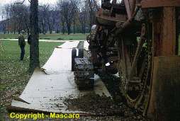 Trenching machine used on golf course to install irrigation. This was a very large trencher. 