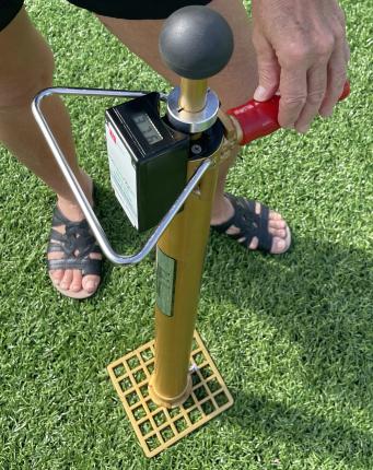 Mascaro Infill and Cleat Depth Tester showing the digital read out after infill depth is measured. Add a 1.00 to display for accurate readings so this reading is 1.564 inches for infill depth