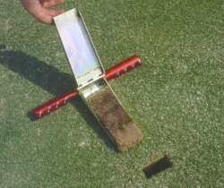 After insertion into the soil, cutter blade is opened to reveal the undisturbed soil profile.