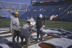 This is the field being painted for SuperBowl XXXIX at Alltel Stadium, Jacksonville, Florida. Brain Johnson, AZ, Sho from Japan, Abby McNeil from Denver and Terry Porch, from Tennessee painting the field.
