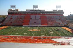 This is the Oklahoma State University Lewis Field at Boone Pickens Stadium in Stillwater.  The surface is artificial Turf